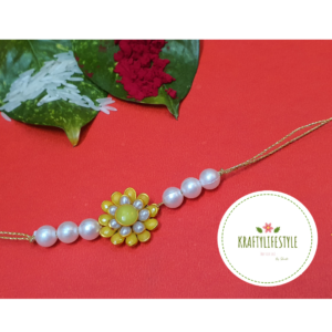 Yellow Pearl & Flower Rakhi